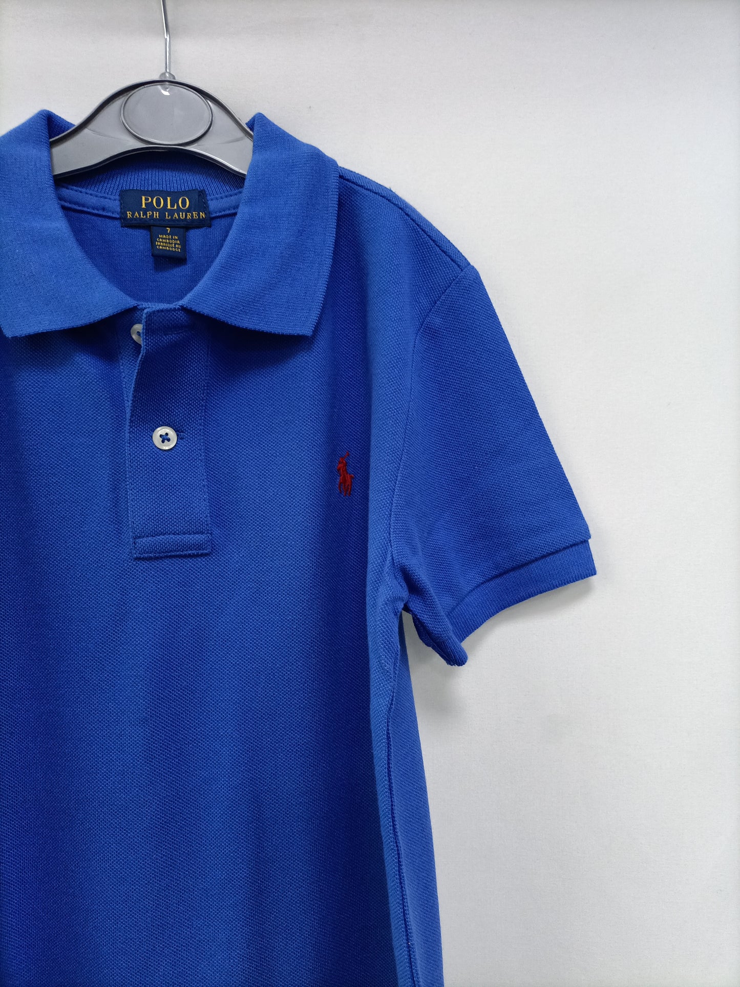 RALPH LAUREN. Polo azul T.7 años