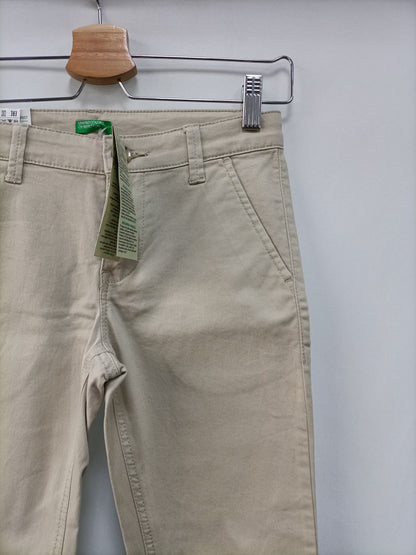 BENETTON. Beige chino trousers, size 7-8 years