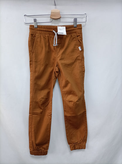 H&M. Pantalón mostaza T.7/8