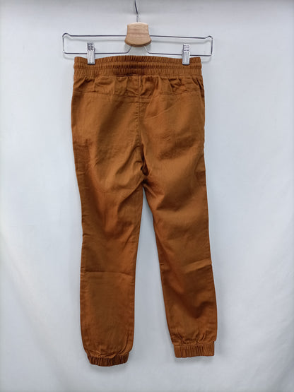 H&M. Pantalón mostaza T.7/8