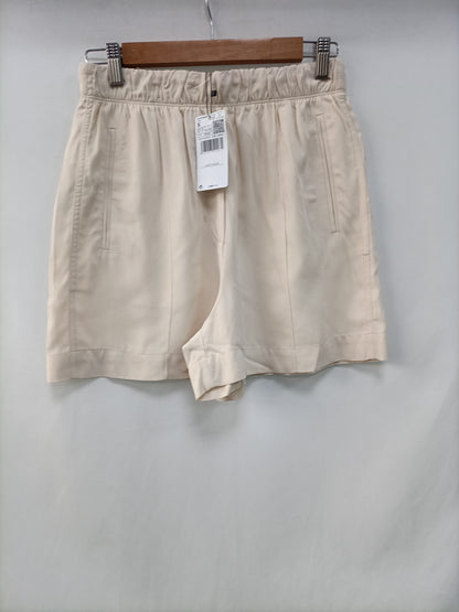 MANGO. Shorts beige fluido T.s
