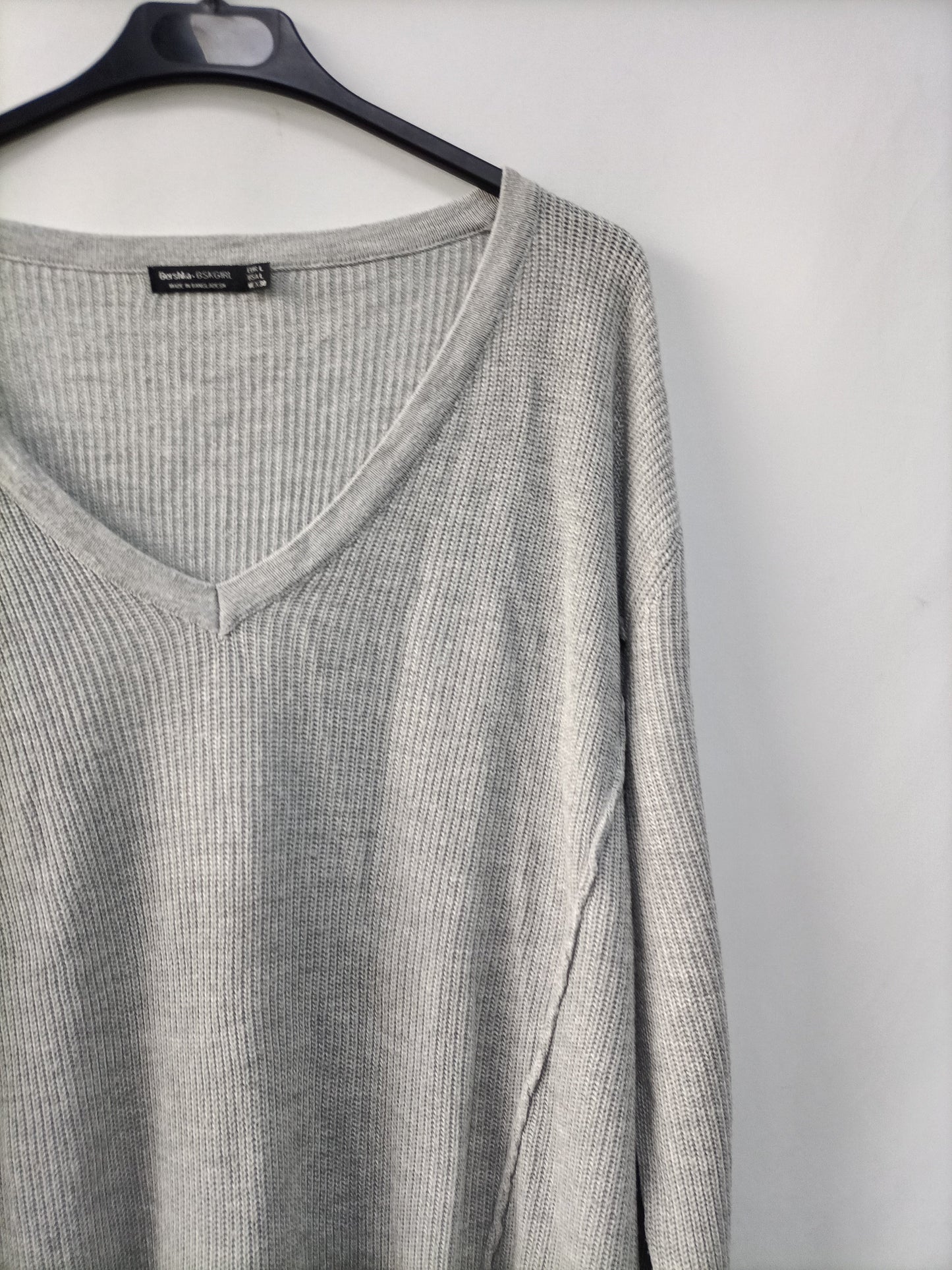 BERSHKA.Jersey gris T.L
