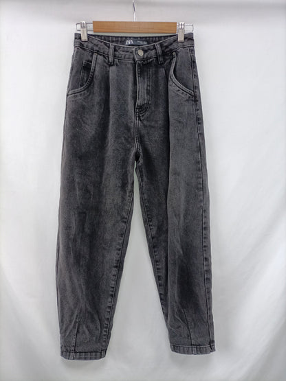 ZARA.Pantalones denim slouchy negros T.34