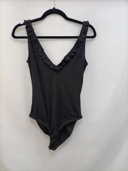 OTRAS. Body negro volante Tu(s)