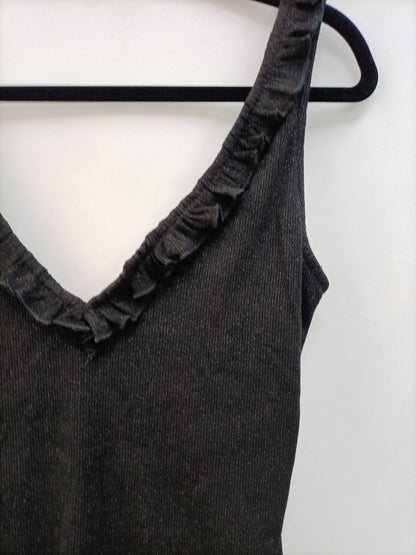 OTRAS. Body negro volante Tu(s)