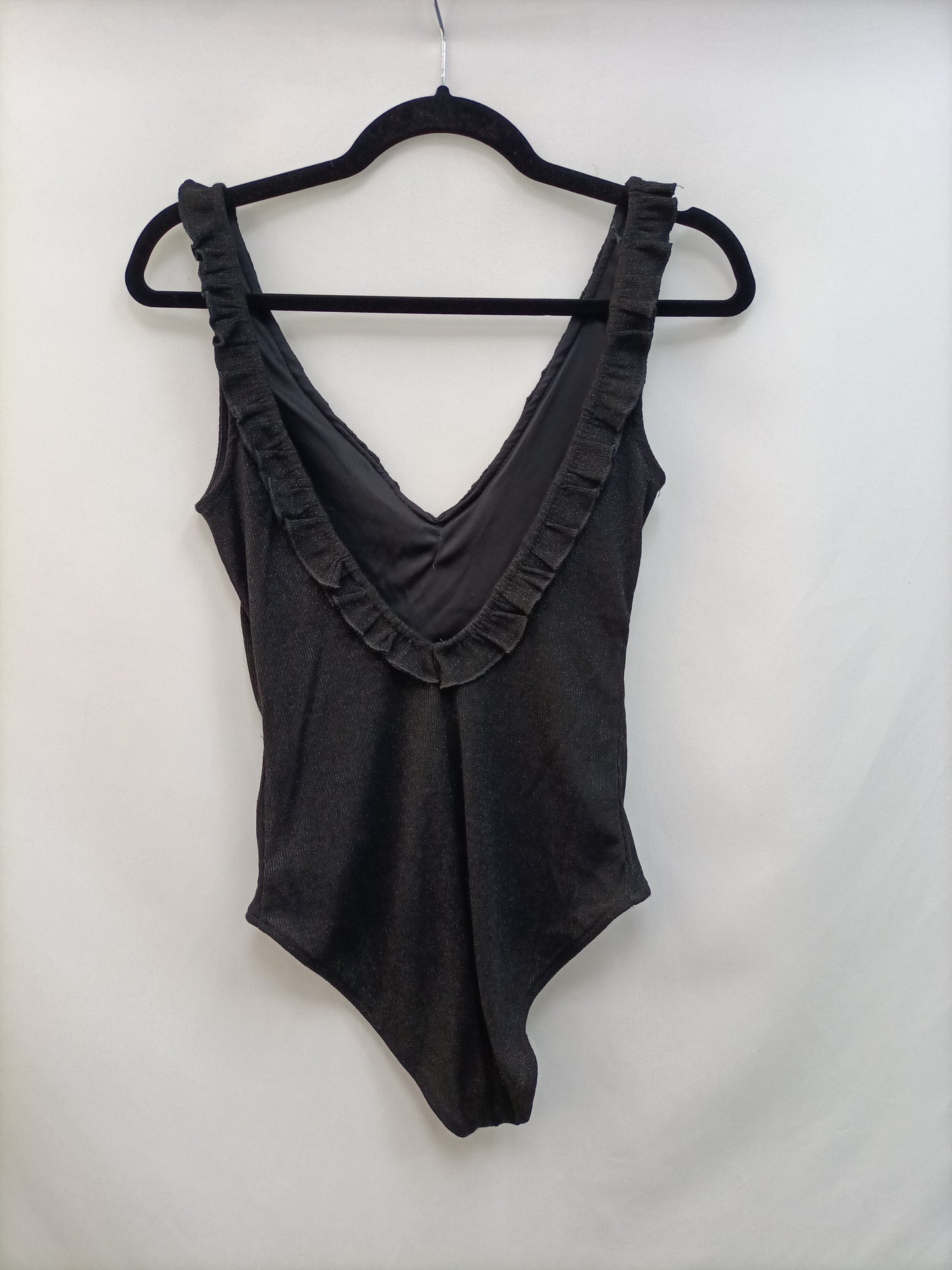 OTRAS. Body negro volante Tu(s)