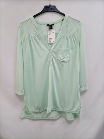 H&M. Blusa verde agua T.s