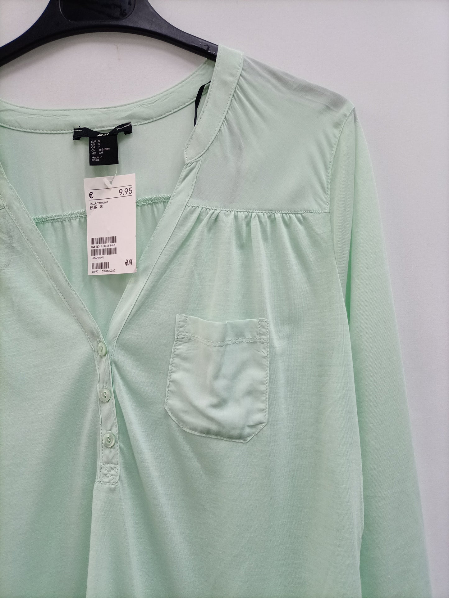 H&M. Blusa verde agua T.s