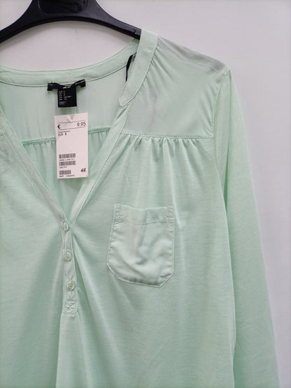 H&M. Blusa verde agua T.s