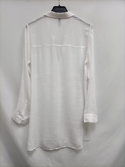 H&M. Blusa blanca oversized T.36