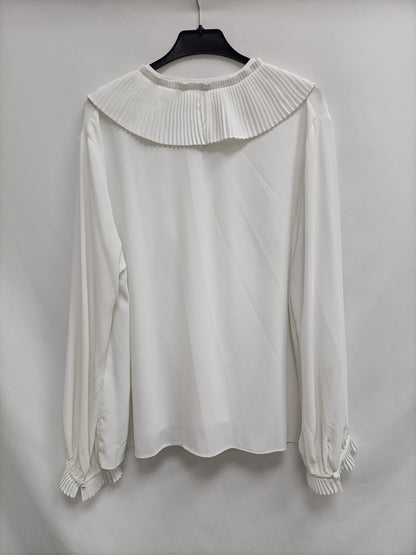 MERLETTI.Blusa blanca volantes T.46