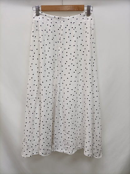 H&M. Falda midi lunares T.34
