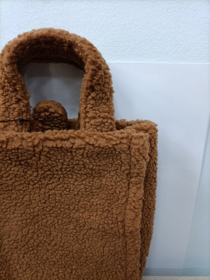 THE DROP. Bolso borrego