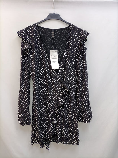 ZARA. Mono negro lunares T.l
