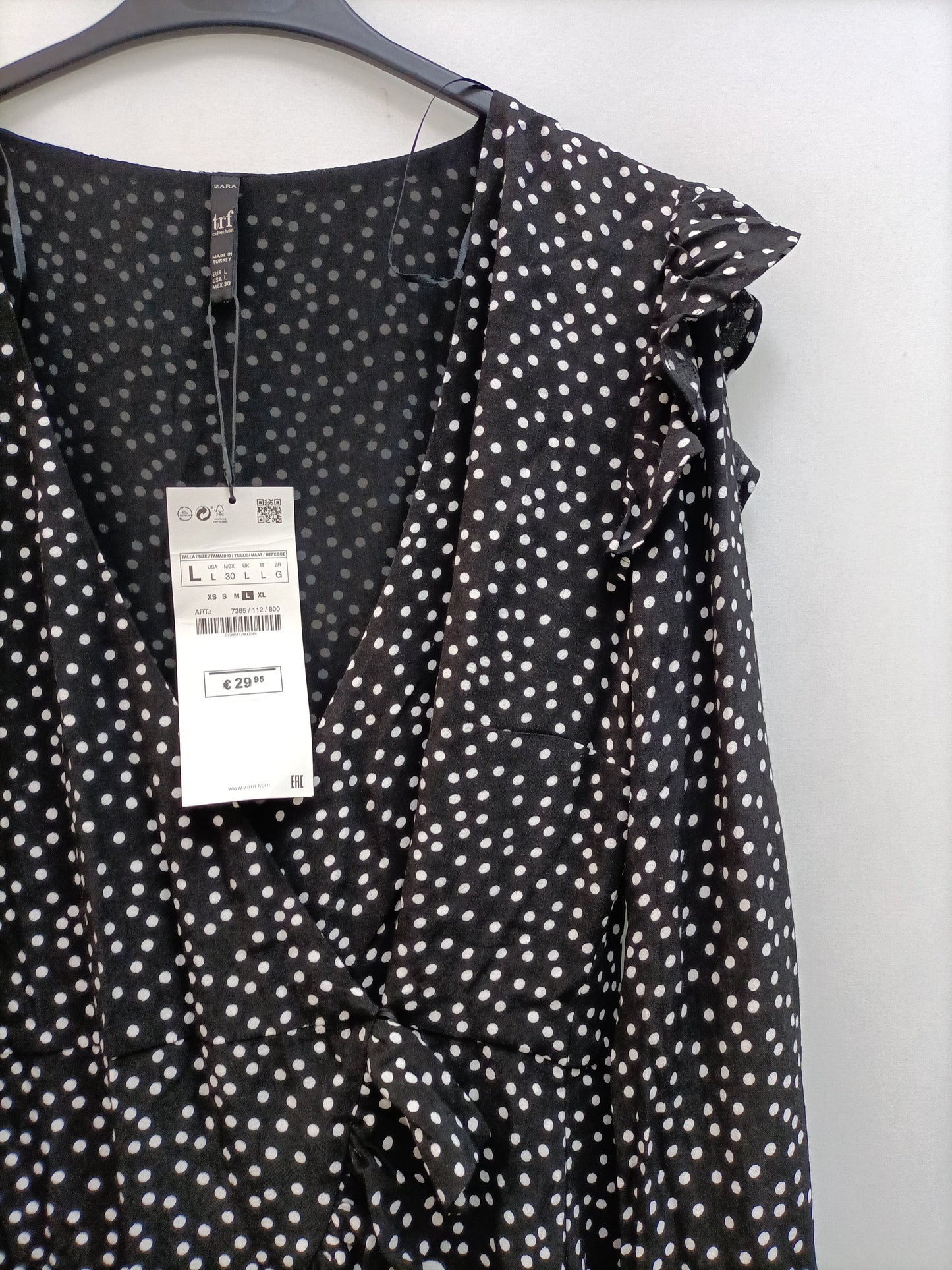 ZARA. Mono negro lunares T.l