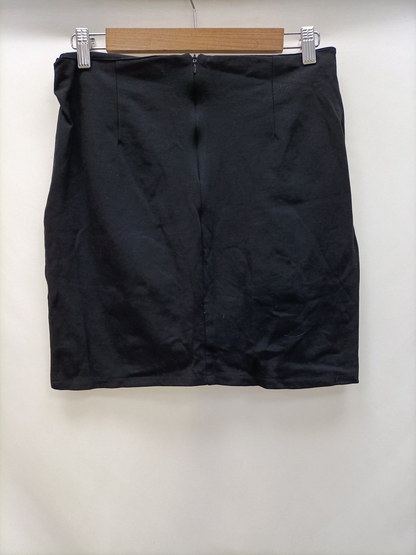 OTRAS. Falda negra botones T.m