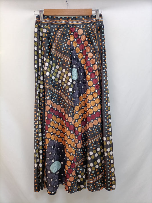 OTRAS. Falda midi terciopelo T,u (34)