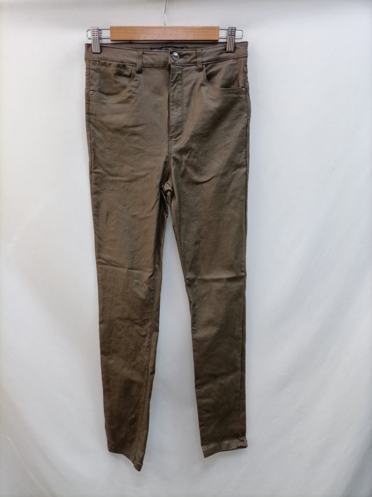 LEFTIES. Pantalón encerado verde T.40