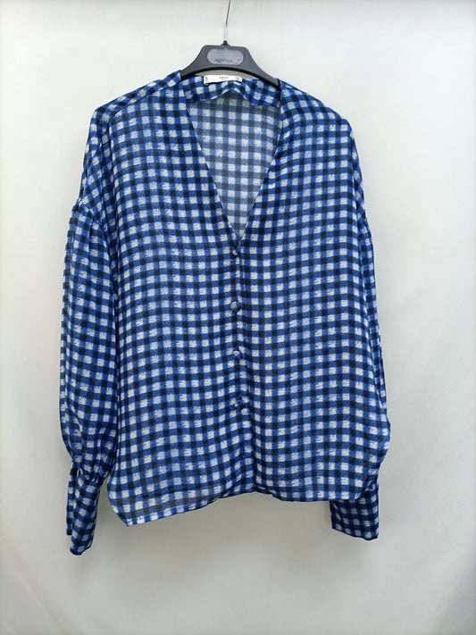 MANGO. Flowy checked Ts blouse