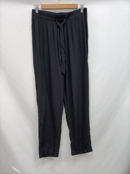 PRIMARK. Black flowy trousers size 40