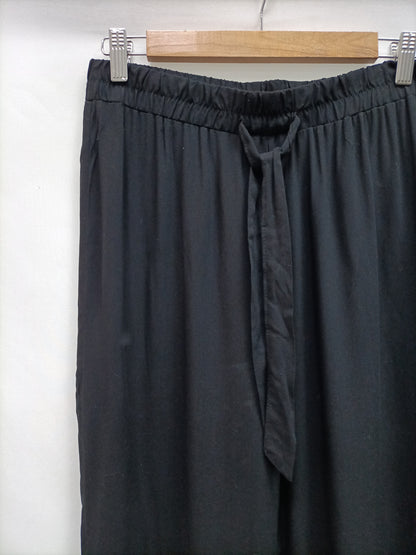 PRIMARK. Black flowy trousers size 40