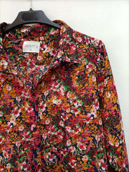 Fantastic company. Flowy floral blouse Ts