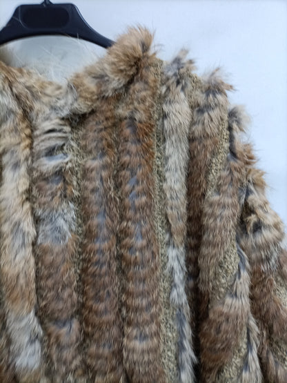 OTRAS. Poncho pelo camel Tu