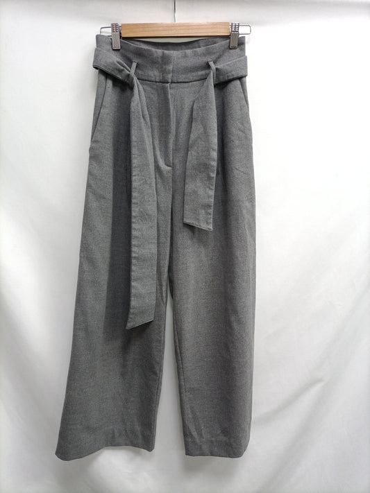 H&M.Pantalones grises tiro alto T.34