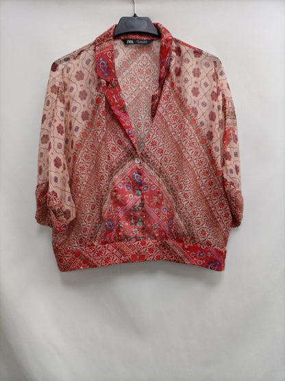 ZARA.Blusa semitransparente T.L