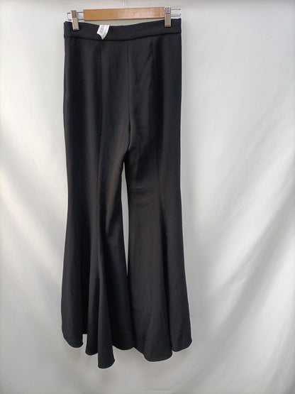 ZARA. Pantalón negro volante T.xs