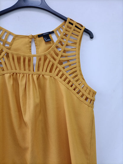 FOREVER21. Top amarillo tiras T.s