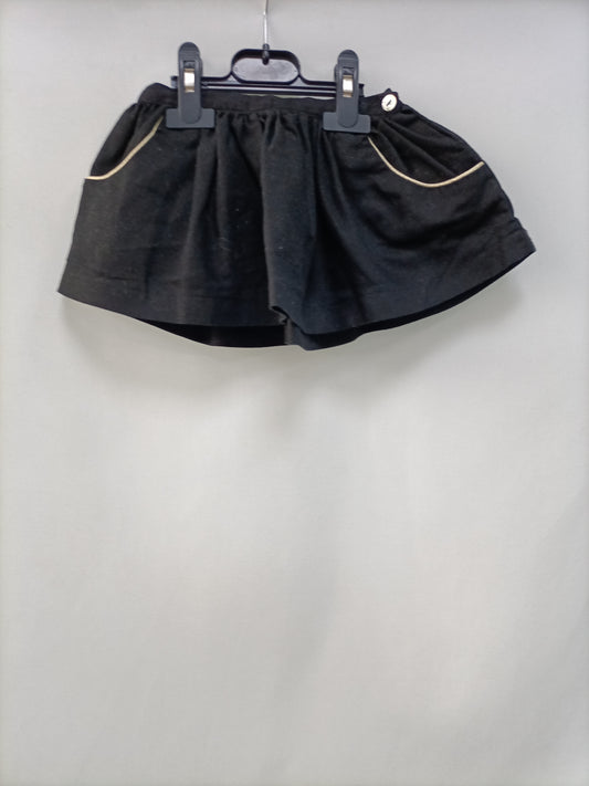 OMINI. Short black skirt, size 2 years