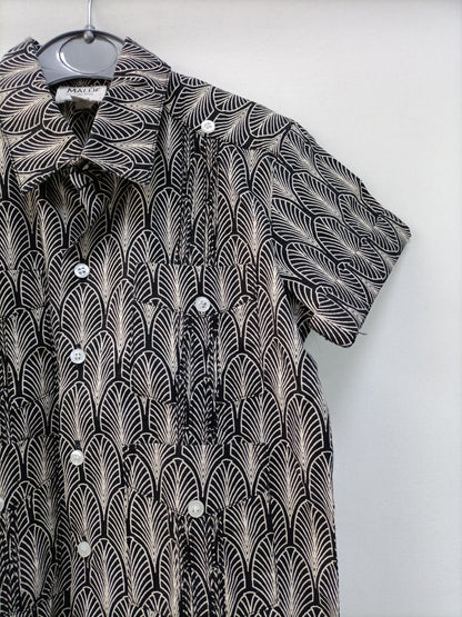 OMINI. Camisa negra estampada T.4 años