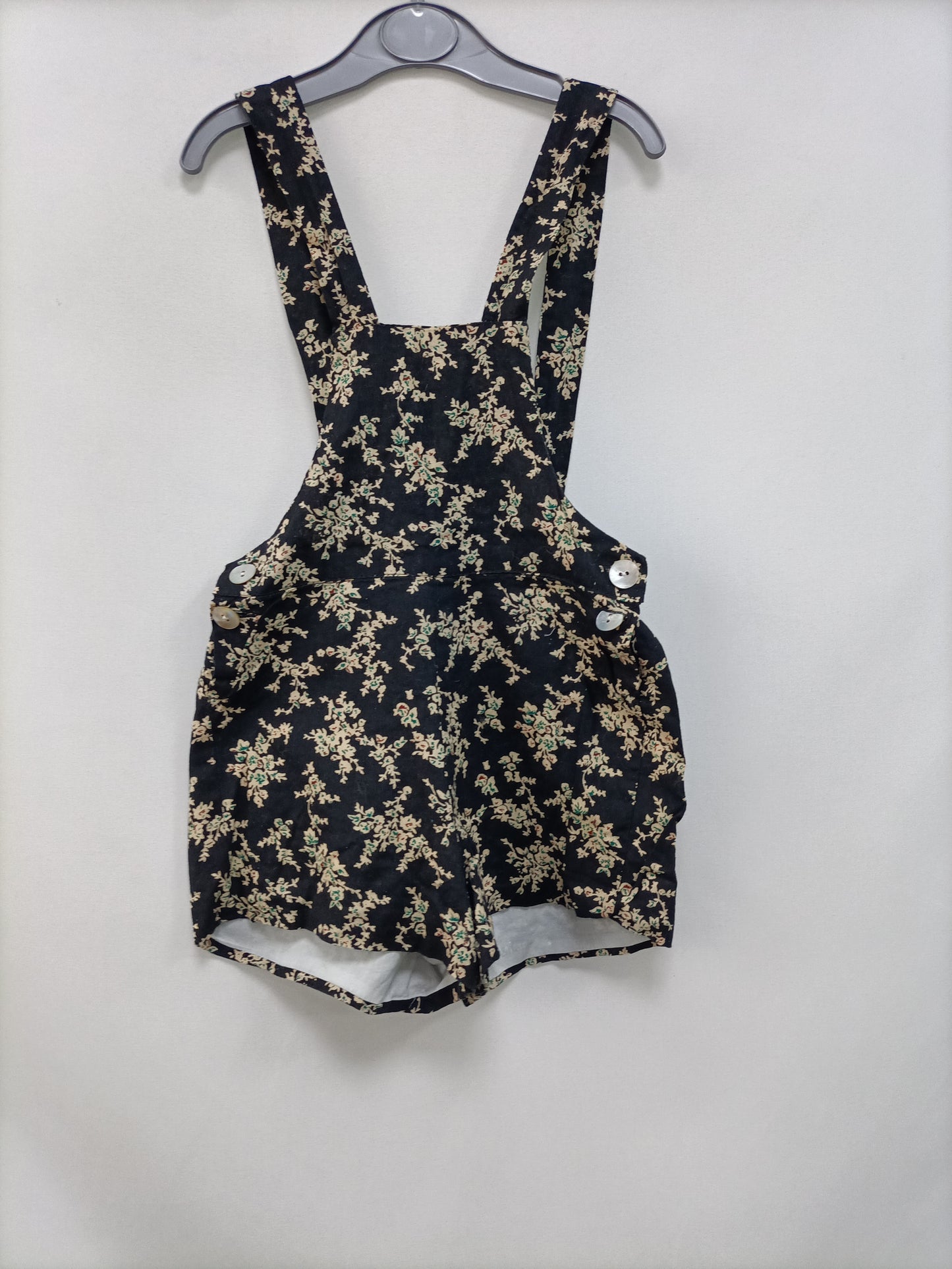 OMINI. Peto negro flores T.2 años