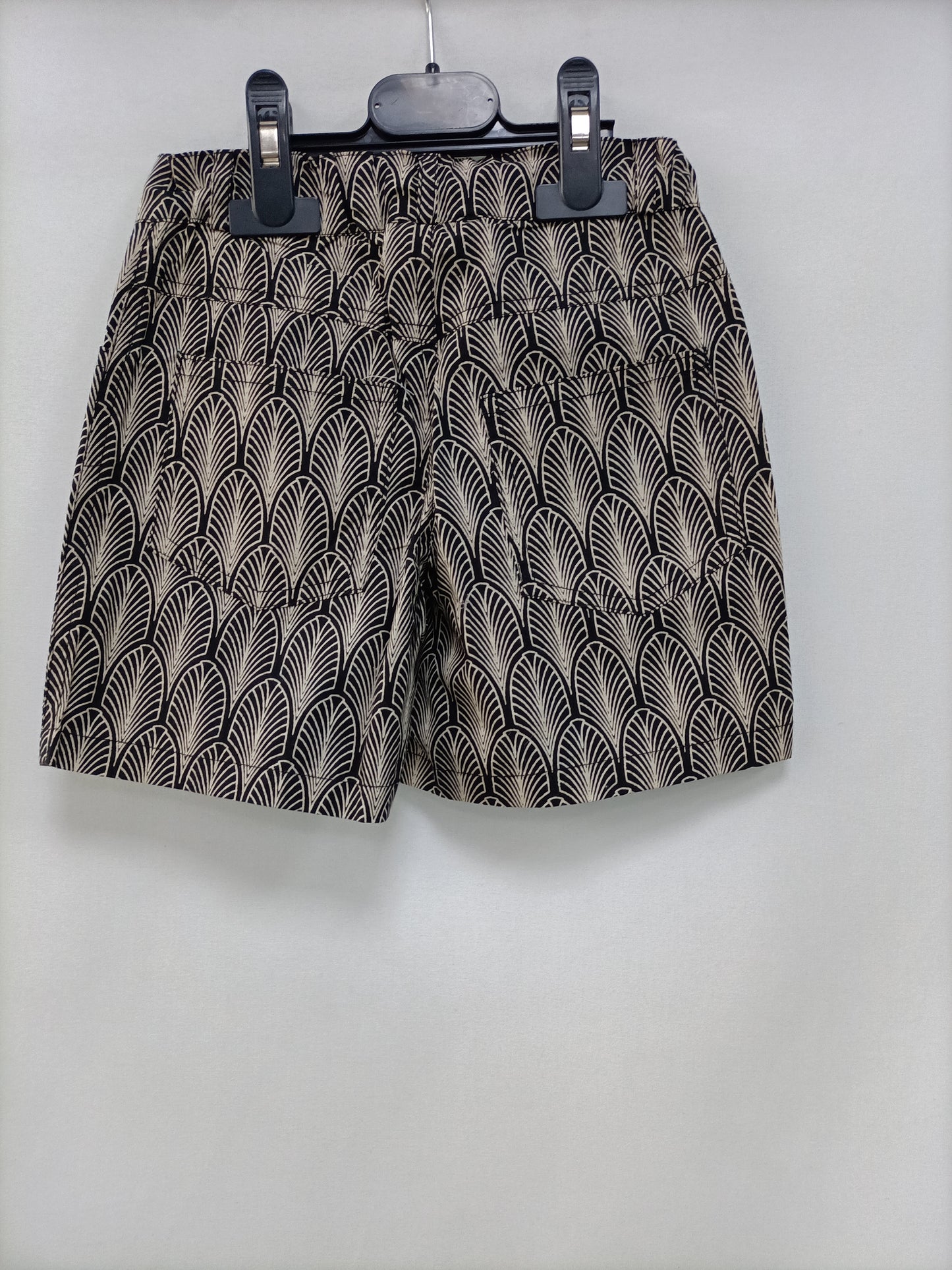 OMINI. Black printed shorts, size 2 years