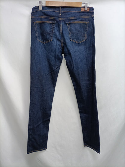 ADRIANO GOLDSHMIED. Dark denim trousers, size 40