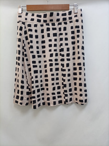 LA FÉE MARABOUTÉE. Tm beige checkered skirt
