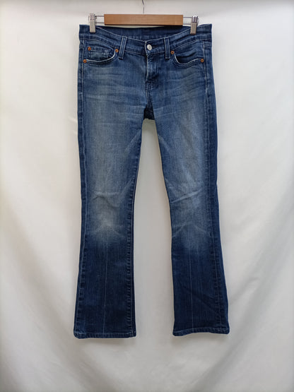7 FOR ALL MAKIND. Pantalón denim campana T.34