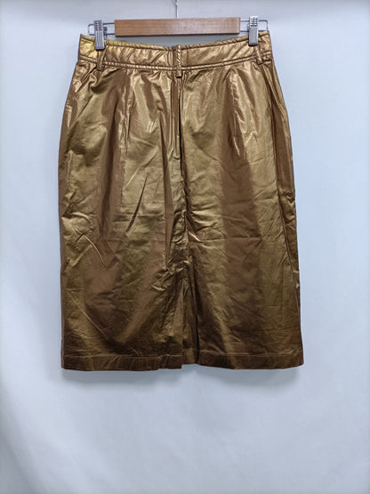 MASSCOB. Falda dorada encerada T.36