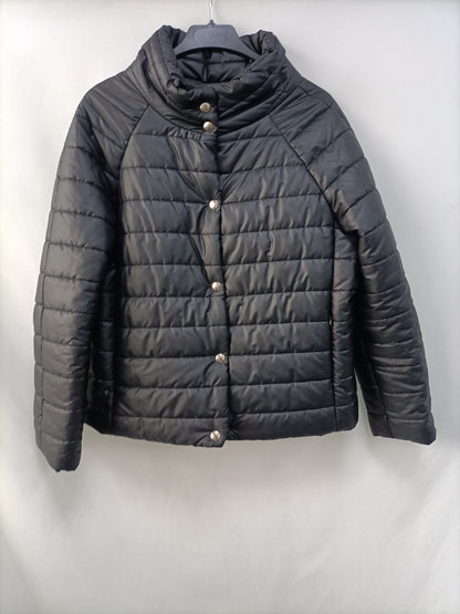 TRUCCO.Plumas negro ligero T.m