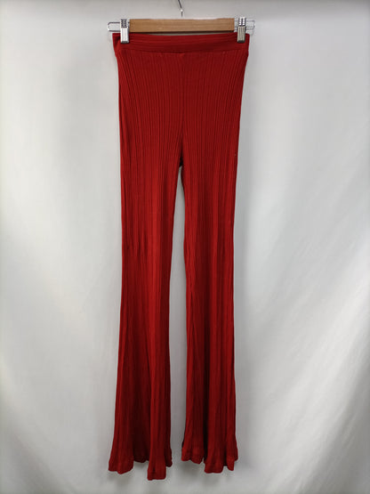 BERSHKA.Pantalones punto elásticos campana T.S