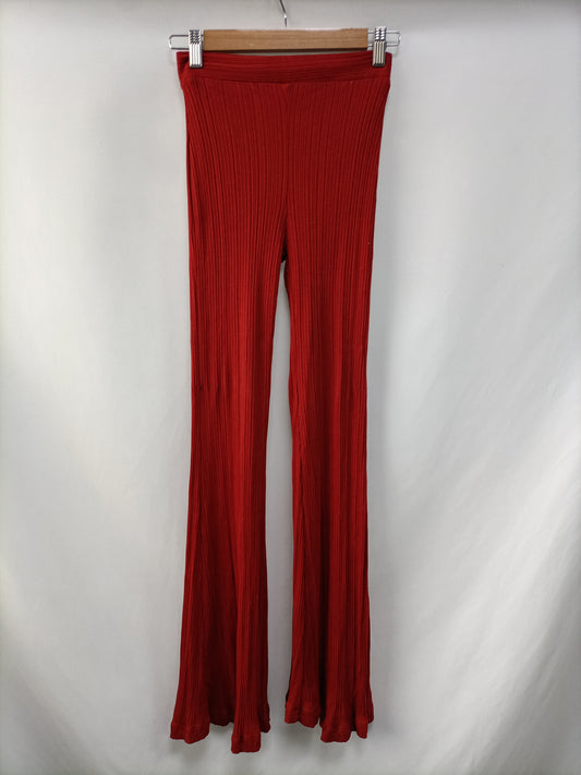 BERSHKA.Pantalones punto elásticos campana T.S