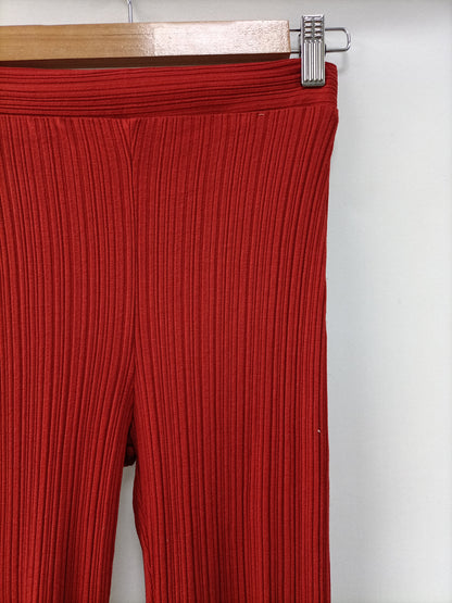 BERSHKA.Pantalones punto elásticos campana T.S