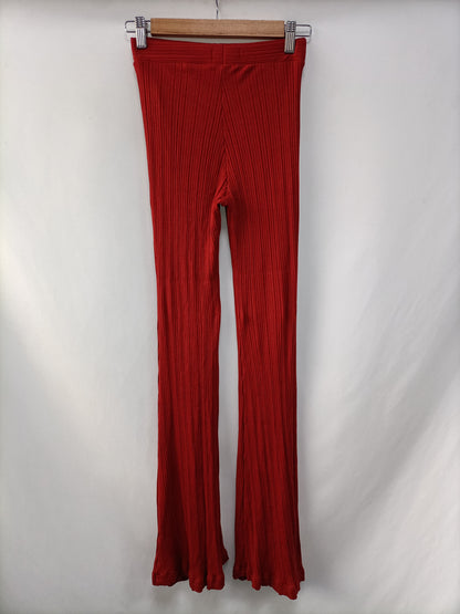 BERSHKA.Pantalones punto elásticos campana T.S