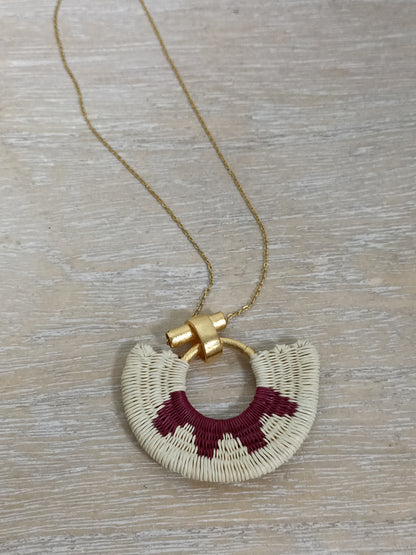 OTHERS. Gold and raffia pendant