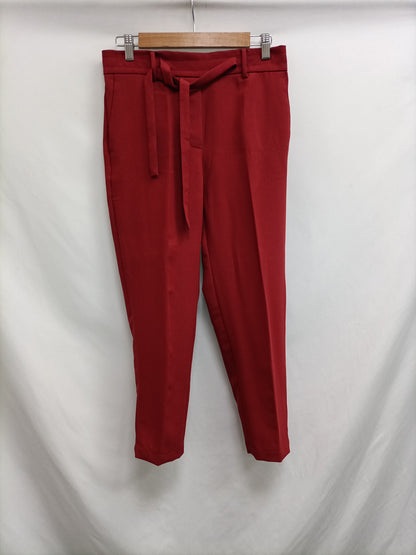 MANGO. Pantalón burdeos fluido T.m