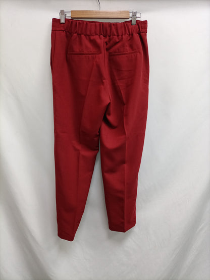 MANGO. Pantalón burdeos fluido T.m