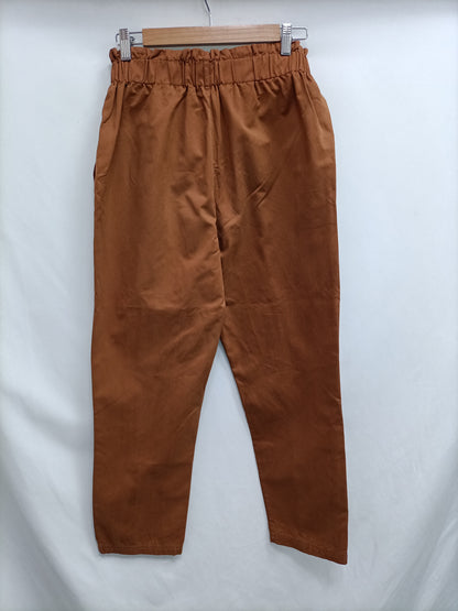 STRADIVARIUS. Pantalón teja T.m (tara)
