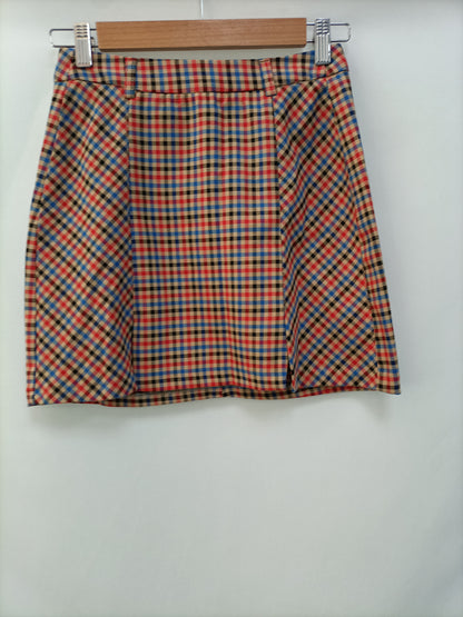 BERSHKA. Falda corta cuadros T.s