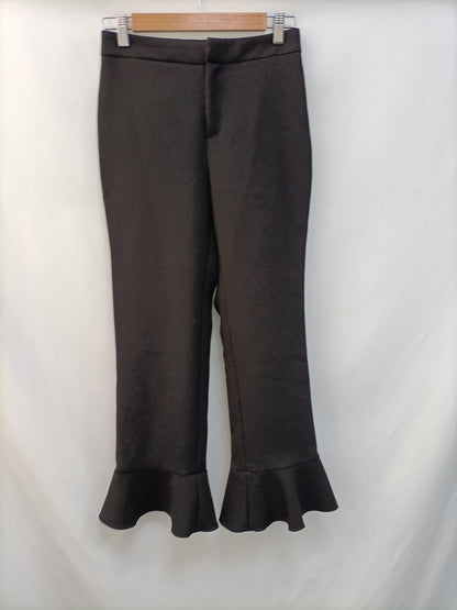 SFERA. Pantalón negro volante T.s